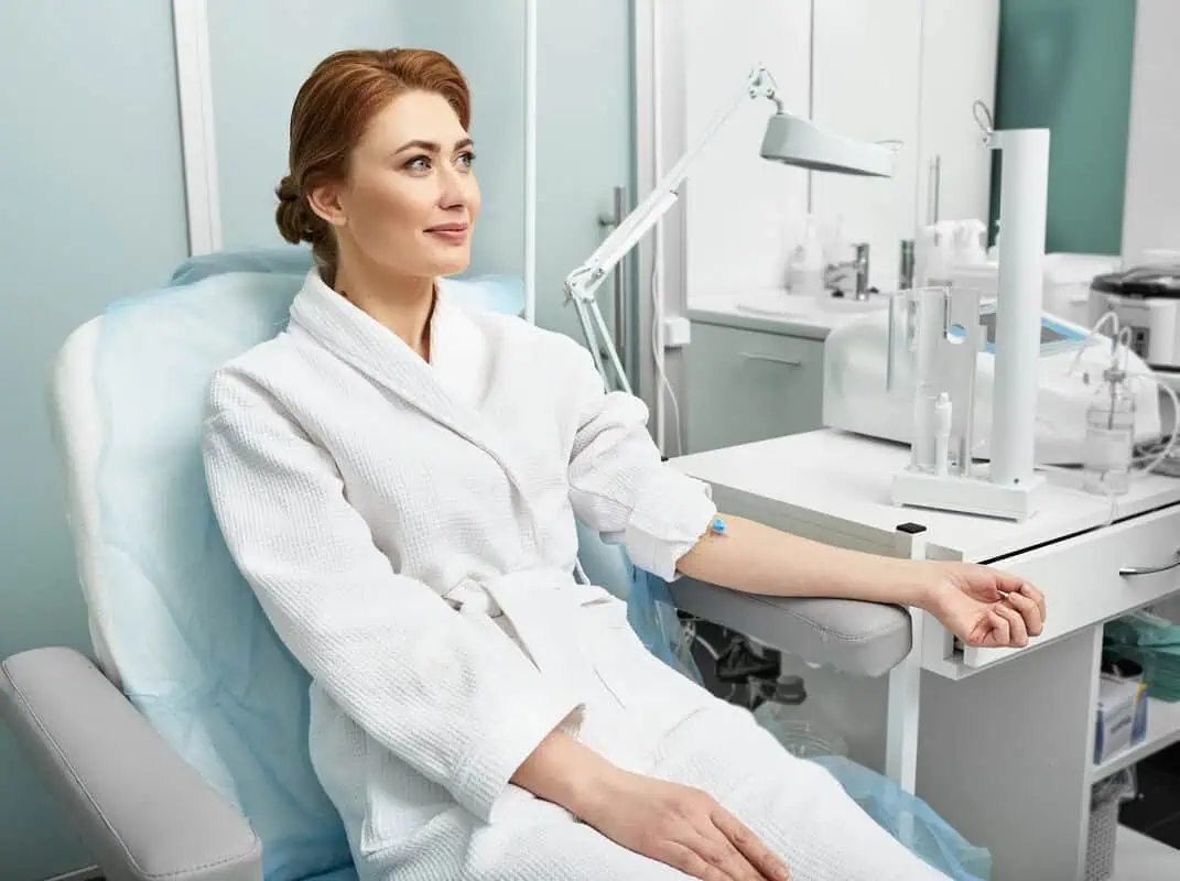 Patient receiving EBOO ozone blood therapy at a wellness clinic in Albuquerque, NM