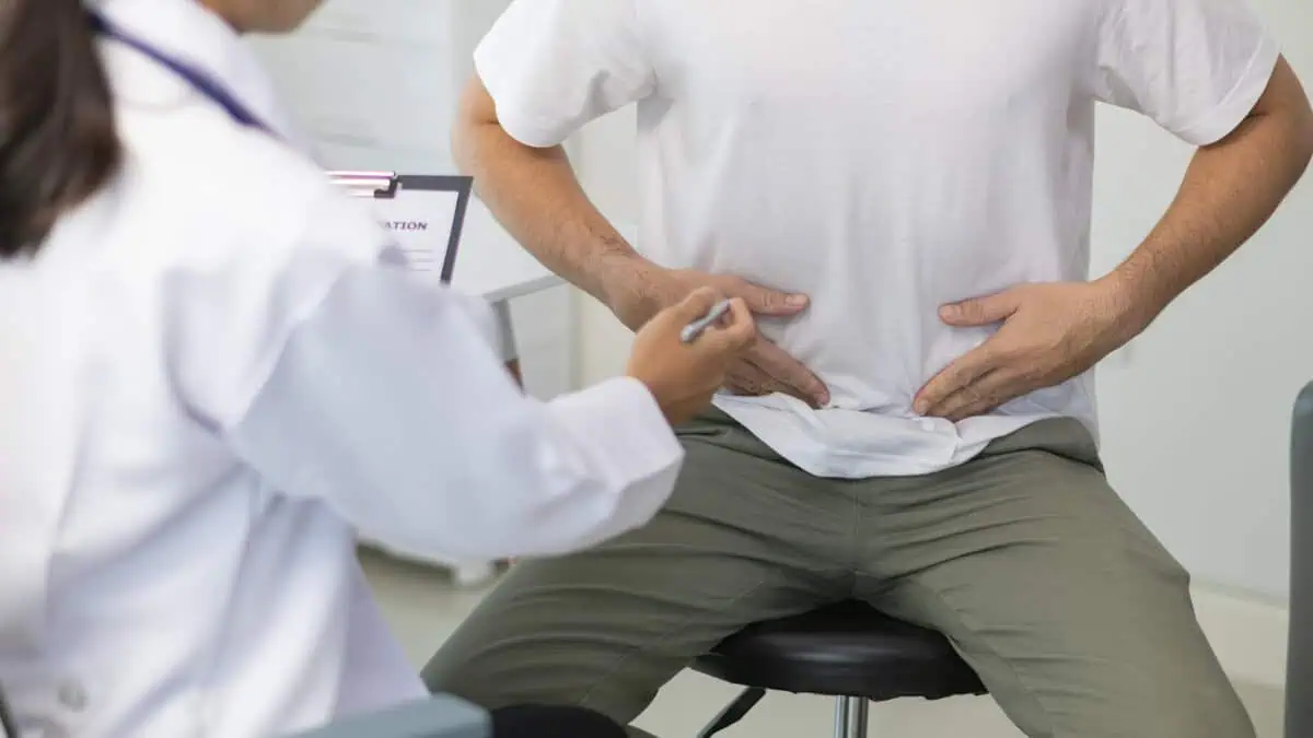 Provider discussing men's wellness treatment options with a patient at Enhanced Wellness NM in Albuquerque, NM.
